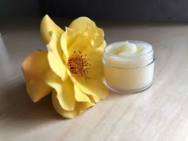 Stackable travel jar and a yellow flower