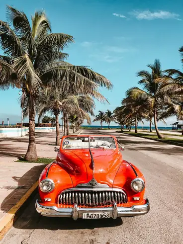 Red retro car on Cuba